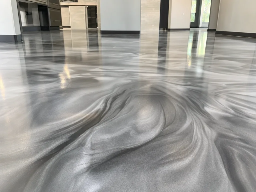 Close-up of charcoal, silver and pearl swirls in a metallic epoxy floor